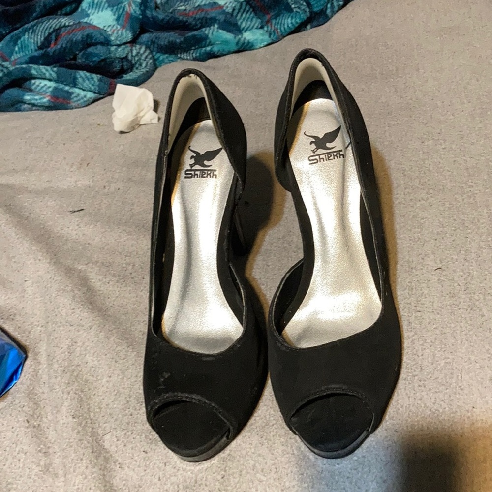 Couple white stains on heels